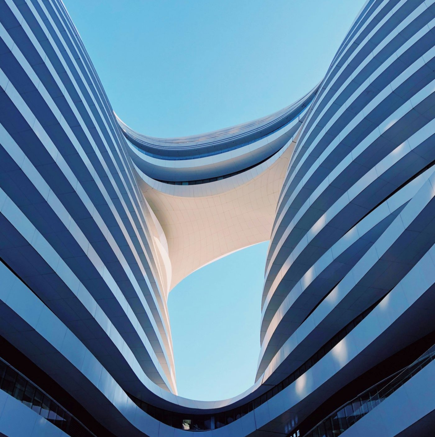Modern architectural structure with precise curved lines
